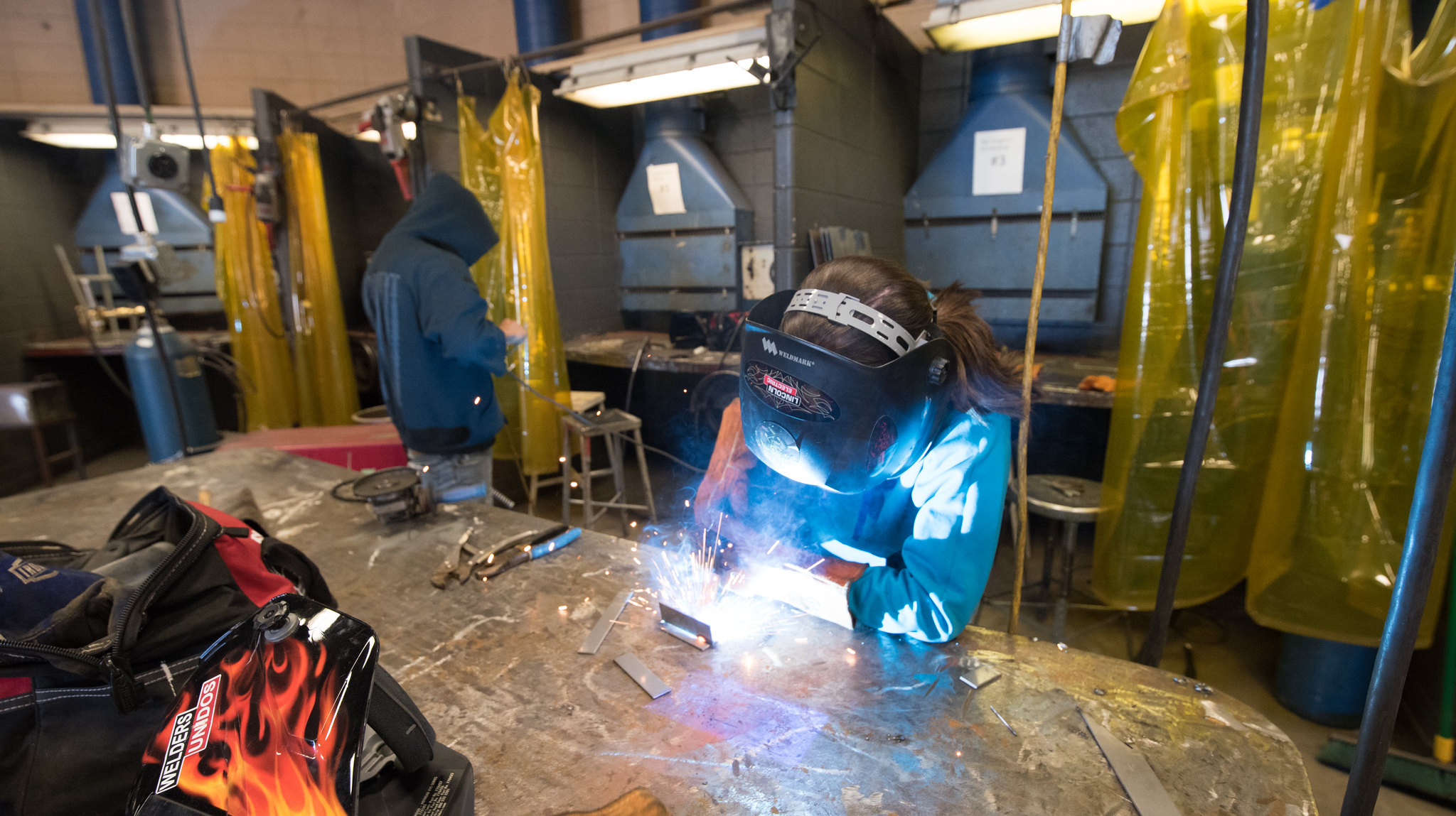 student in a welding class